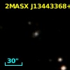 2MASX J13443368+0009534