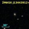 2MASX J13443912+0002251