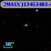 2MASX J13453403+0025532