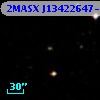 2MASX J13422647-0055393