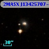 2MASX J13425707-0456540