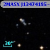 2MASX J13474185-0531579