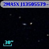 2MASX J13505579-0641204