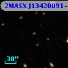 2MASX J13420091-1204394