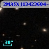 2MASX J13423604-1135324