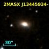 2MASX J13445934-1701381