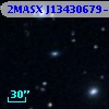 2MASX J13430679-2013565