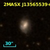 2MASX J13565539+1408327