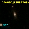 2MASX J13582708+1329051