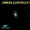 2MASX J13570117+1136412