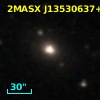 2MASX J13530637+0508586