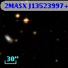 2MASX J13523997+0008038