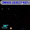 2MASS J13523417+0000463