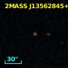 2MASS J13562845+0008061