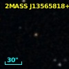 2MASS J13565818+0002069