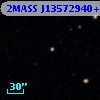 2MASS J13572940+0008561