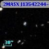 2MASX J13542244-0521311