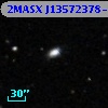2MASX J13572378-0653191