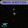 2MASX J13572133-0548403