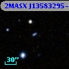 2MASX J13583295-1137210