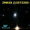 2MASX J13572202-2656031