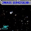 2MASS J19425630-1029211