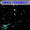 2MASS J19430557-1010552
