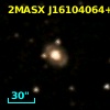 2MASX J16104064+0206395
