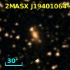 2MASX J19401064+0000567