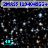 2MASS J19404955+1239458