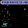 87GB 045412.9+465602