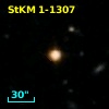 2MASS J16064858+1845579