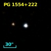 2MASS J15563361+2202459