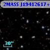 2MASS J19412617+2303217