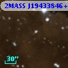 2MASS J19433846+2320064