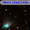 2MASS J19422439+2306226