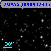 2MASX J19094234+3121327