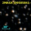 2MASX J09585841-6643458