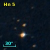 2MASS J11064180-7635489