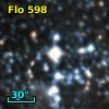 2MASS J01112045-7222169