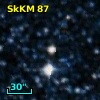 2MASS J00521551-7203320
