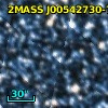 2MASS J00542730-7219388