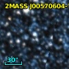 2MASS J00570604-7201598
