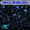 2MASS J01065863-7203499