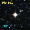 2MASS J01054817-7057011
