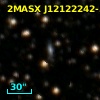 2MASX J12122242-5300331