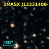 2MASX J12331408-5555536