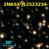 2MASX J12523234-7137313