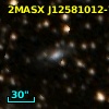 2MASX J12581012-7210356