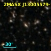 2MASX J13005579-7112197